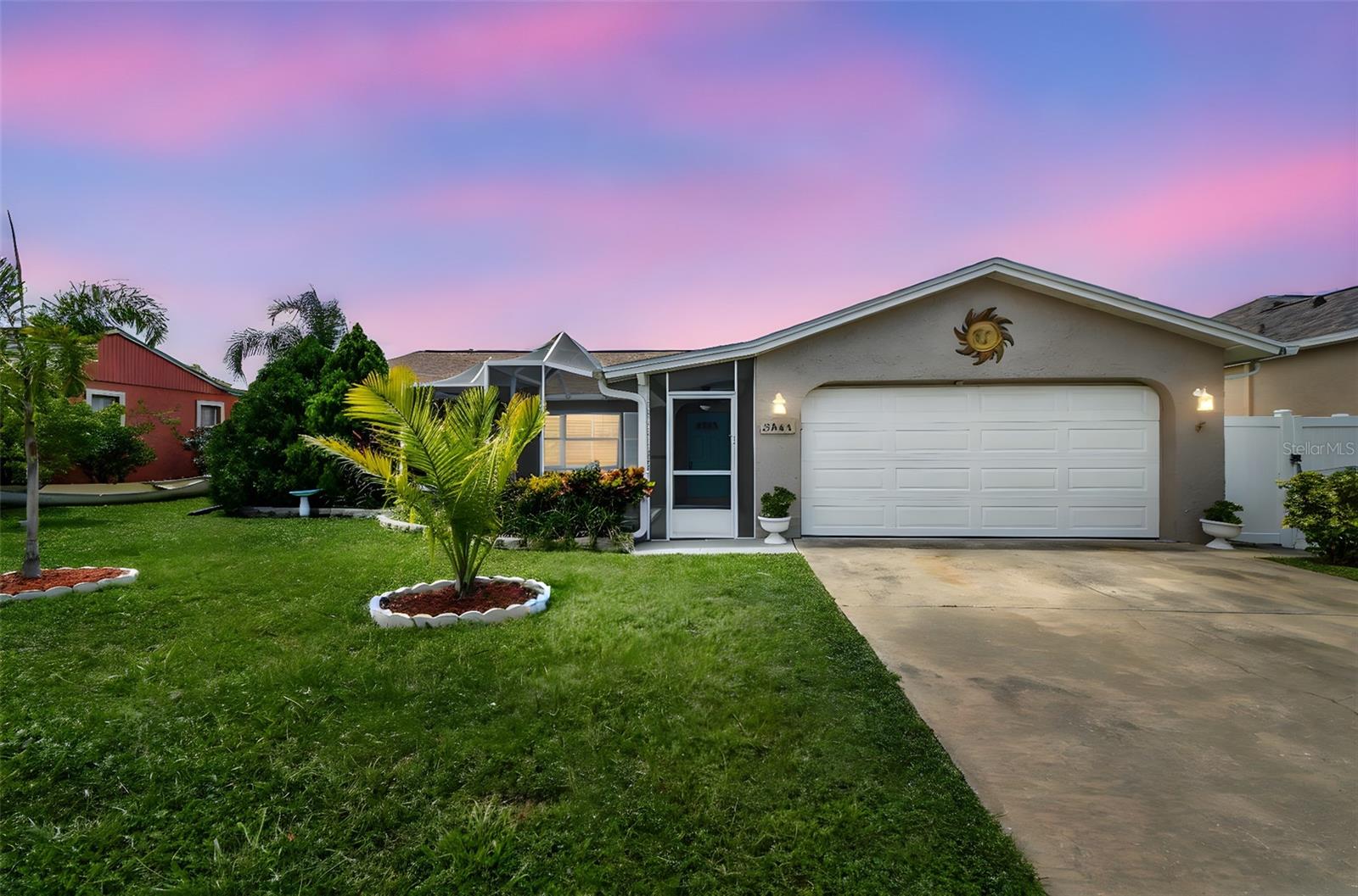 This beautifully updated 3-bedroom, 2-bathroom home (1,513 sq ft) features a stunning backyard designed for both relaxation and fun — complete with brand-new turf, a custom putting green, and sustainable rain buckets to keep your plants thriving with ease. The quiet setting, backed by a vacant lot, offers unmatched peace and privacy.
Enjoy year-round outdoor living in the fully enclosed Florida room, cooled with a window A/C unit and perfect for entertaining or unwinding. Both the front and back patios have been renovated with fresh decking, while the garage has been upgraded with a new floor coating.
Inside, you’ll find fresh interior shutters, a 5-month-old water heater, and a bright, functional layout ideal for everyday living. The home also includes a shed for extra storage, a 6-year-old roof, and brand-new palm trees that enhance curb appeal.
Located just a short walk from a park with a playground, and with optional HOA membership to a nearby community center offering a clubhouse, resort-style pool, and play zone — this home blends outdoor luxury with everyday comfort.
