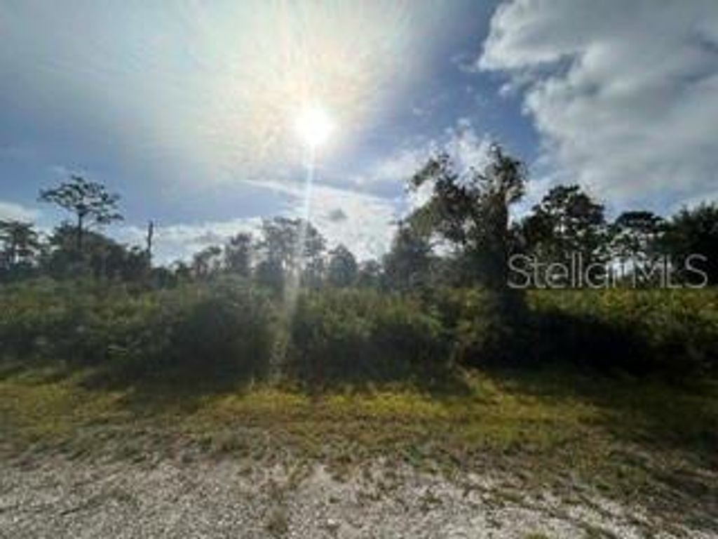 Photo of 63 El Dorado Drive, Indian Lake Estates, FL 33855 (MLS # TB8511300)