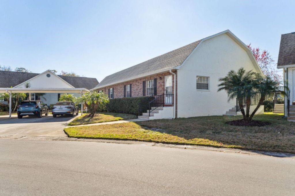 Photo of 6710 Hickorywood Ln #1B, New Port Richey, FL 34653 (MLS # W7874234)