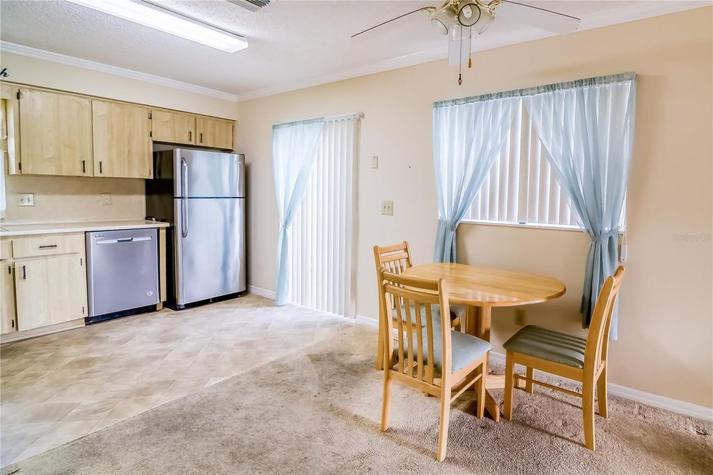 Photo of 6710 Hickorywood Ln #1B, New Port Richey, FL 34653 (MLS # W7874234)