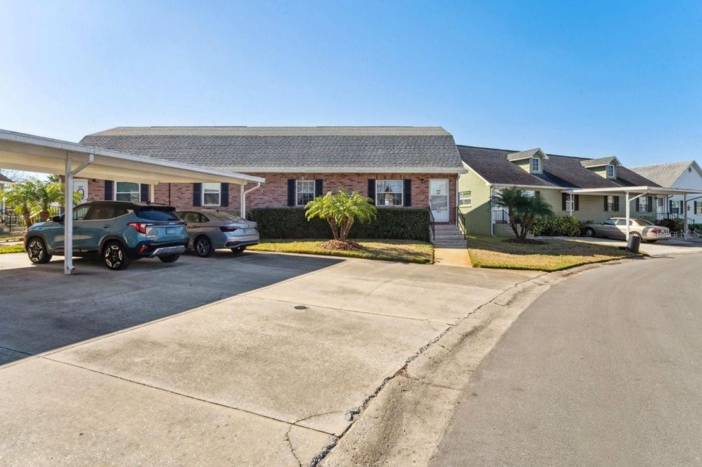 Photo of 6710 Hickorywood Ln #1B, New Port Richey, FL 34653 (MLS # W7874234)