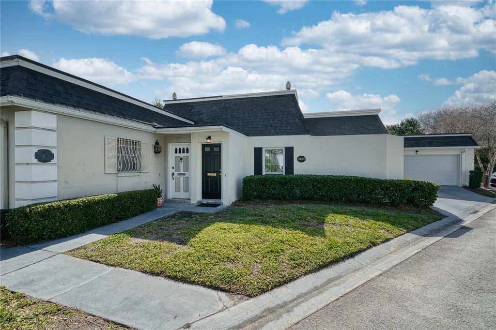 Photo of 2084 Countryside Circle S #25, Orlando, FL 32804 (MLS # O6374917)