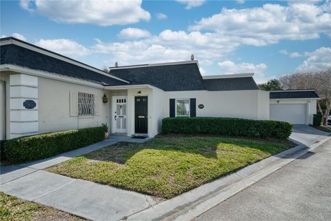 Photo of 2084 Countryside Circle S #25, Orlando, FL 32804 (MLS # O6374917)