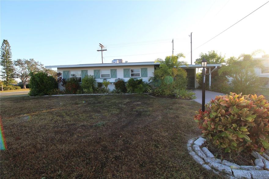 Enjoy your Florida lifestyle in this lovely home, complete with carport as well as interior golf cart bay.  This ANNUAL LISTING is a two bedroom/two bathroom, with enclosed Florida room, spacious laundry room, and plenty of extra storage, making it a great place for friends and family to gather.  Pretty bamboo flooring, tiled Florida room, decorative touches and good natural light throughout, give this home a real Florida charm.  Owner will consider one small pet with $250 non-refundable pet fee.  Chevy Chase is located in Sun City Center, a 55+ age restricted community with amenities, clubs and activities to keep you as busy as you choose to be. Sun City Center is near the West coast of Florida between Tampa and Sarasota, short drives to beaches, parks, airports, shopping, dining, medical and more. Come join us, walk on our beaches, hike on our trails, canoe on our rivers, you will be glad you did.