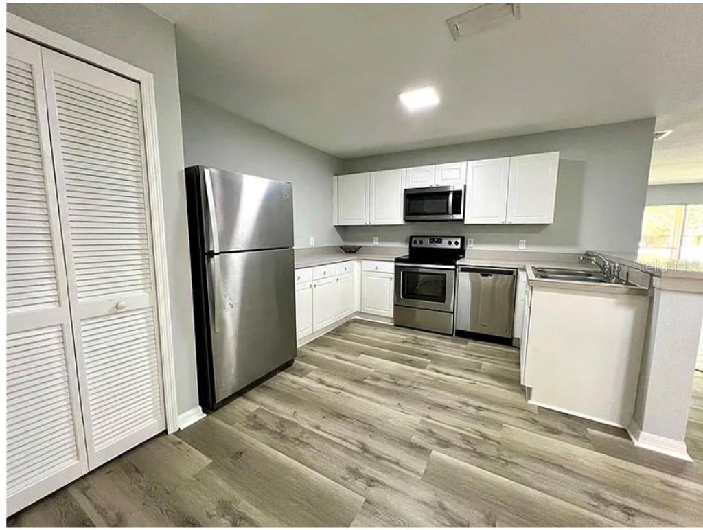 Photo of 2878 Club Cortile Circle #A, Kissimmee, FL 34746 (MLS # O6377304)