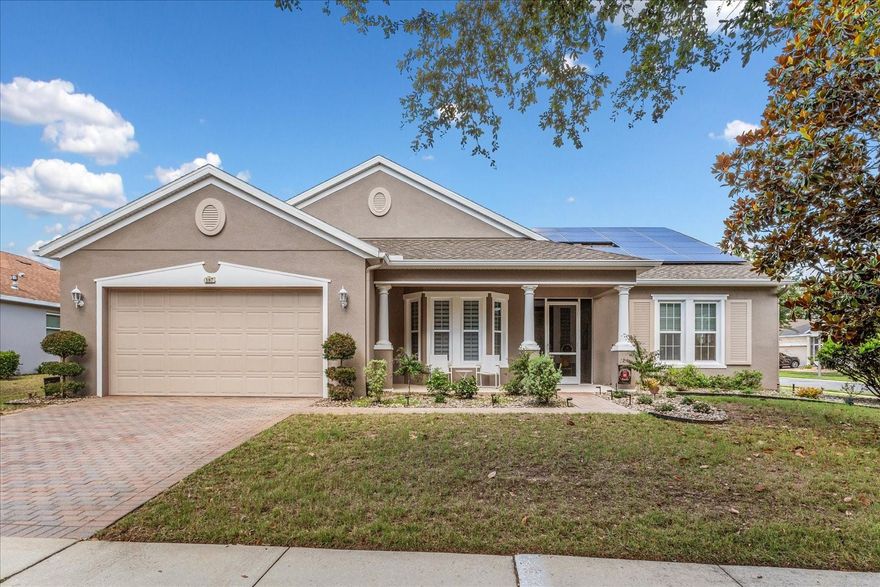 Live the Florida lifestyle in this beautifully upgraded home in the highly sought-after resort-style community of Trilogy.  The home is well-maintained with valuable recent upgrades, including a new roof, a 2025 water heater, solar for added energy efficiency, new water softener and a new controlled sprinkler system.
Perfectly positioned on an oversized corner lot, this impressive residence offers standout curb appeal with a screened front porch, designer front door with sidelight, all welcoming you into a light-filled open floor plan designed for both comfort and entertaining.
Inside, you will discover 2 bedrooms, 2 baths, and a versatile den, including a private en suite bath for the second bedroom—ideal for guests. There is a mosaic custom tiled inlay in the foyer, and no carpet, giving the home a clean, stylish feel throughout. The updated kitchen features a gas stove, custom pantry, cabinetry with under-cabinet lighting, and newer appliances, while custom arches add distinctive architectural character. Every detail has been thoughtfully maintained, including twice-yearly A/C service, a termite bond, and numerous functional upgrades that make everyday living effortless.
The oversized primary bedroom is a true retreat, complete with custom remote blackout shades, a massive built-in closet, and a custom doorway leading directly to the laundry room. An enclosed lanai with split A/C unit extend your living space beautifully for year-round enjoyment while an outdoor kitchen rounds out entertaining space. The smart space can easily function as a laundry room, office, or hobby room. The garage is equally impressive with shark coating flooring, storage cabinets, and a new opener. Even the furnishings have flexibility—furniture and the piano are negotiable—making this exceptional Trilogy home an outstanding opportunity.
Trilogy Cascades of Groveland is a guard gated community centered around the 57,000 sq. ft. Magnolia House and focuses on exercise and entertainment. A full-service restaurant and bar, two gyms, indoor and outdoor pools, spas, a walking trail, dog park, tennis, pickle and bocce ball await you.  50+ clubs, concerts, shows, demonstration kitchen, massage room, dance studio, poker lounge, golf simulator, billiards and more add to living your desired lifestyle.  
The HOA monthly fees include lawn/shrub maintenance, basic cable, internet with landline, home security monitoring, streetlights, street maintenance, guard gated front entrance and clubhouse amenities.
The community allows residents between the ages of 45 to 54 with HOA approval.  
This home is a rare find, blending luxury and practicality while living in a vibrant community. 
You may be sorry if you miss out on this one-of-a-kind home.  Call now for your private showing.