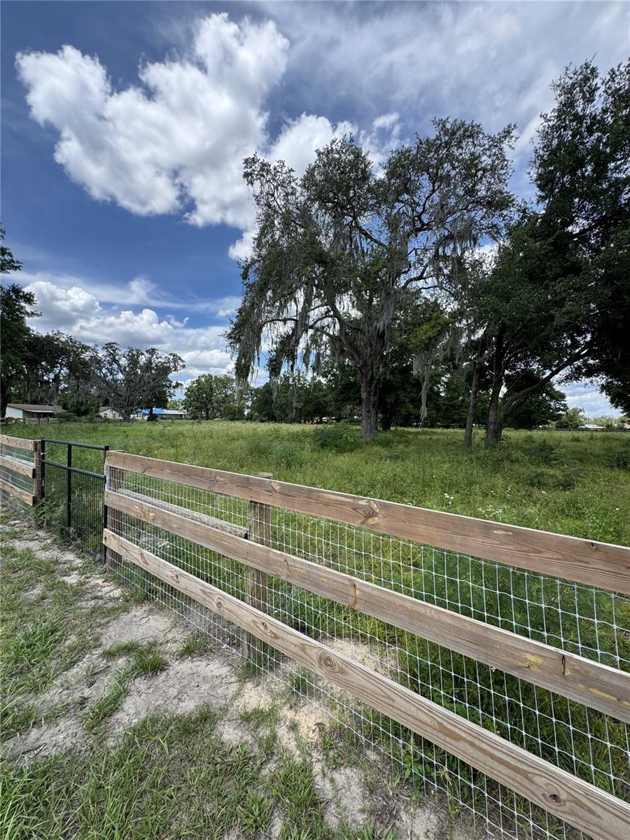 This A-1 property offers 4.42 acres with frontage on Hwy 200/College Road, located just east of the Lowe's Home Improvement store.
It includes an older home with little value, well, septic and fenced in field.
Additionally, two adjacent properties (Parcel IDs: 3564-032-000, 35670-001-00) are also available from the seller for potential combined development.