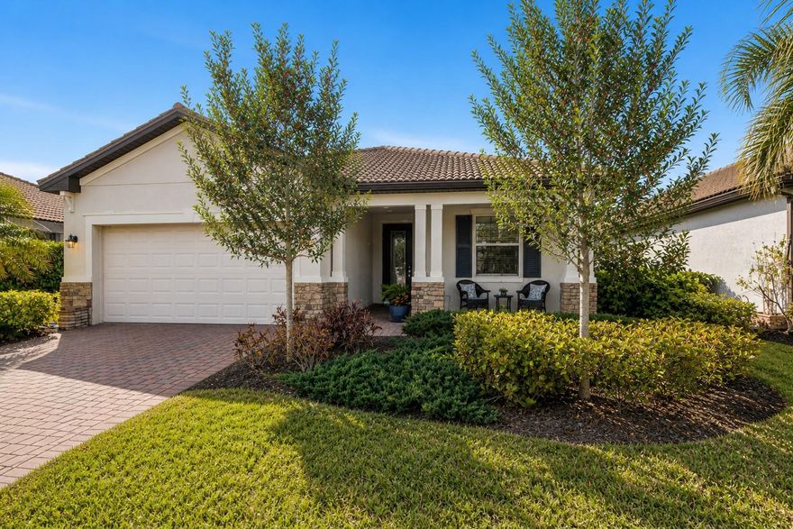 PRIME LOCATION! Great value in Watercrest ideally located just 5 miles from the pristine shores of Venice Beach and Downtown. Discover this exceptional 3-bedroom, 3-bathroom home in a sought-after gated community. From the moment you arrive, you’ll be welcomed by beautiful new landscaping that sets the tone for what awaits inside. The covered front porch is great for sitting and relaxing while offering privacy and space. The thoughtfully designed open-concept layout seamlessly connects the living, dining, and kitchen areas, creating a bright and inviting atmosphere filled with natural light. The kitchen is a true focal point featuring granite countertops, stainless steel appliances, walk in pantry and large center island —perfect for everyday living and entertaining. Tile flooring throughout all main areas. The spacious primary suite serves as a private retreat, complete with a luxurious en-suite bath featuring dual sinks, a generous step-in shower, soaking tub and dual walk in closets. The second bedroom acts as a junior suite, great for children, parents or guests needing their own space. The third bedroom has a full bath outside the door. Step outside to your screened lanai with pavers and take in one of this home’s most captivating features—a sunset-facing backyard overlooking a large, tranquil lake. Enjoy breathtaking evening skies reflecting over the water, creating the perfect setting for relaxing, entertaining, or simply soaking in the peaceful view. The open yard offers space for a pool, all while enjoying expansive water views. Residents of Watercrest enjoy access to desirable amenities, including a community pool and fitness center, all within the security and privacy of a gated neighborhood. With convenient access to Venice Beach, shopping, dining, and the interstate, this home perfectly balances tranquility and accessibility. Don’t miss this opportunity to own a beautiful lakefront home with stunning sunset views in one of Venice’s most desirable communities!
