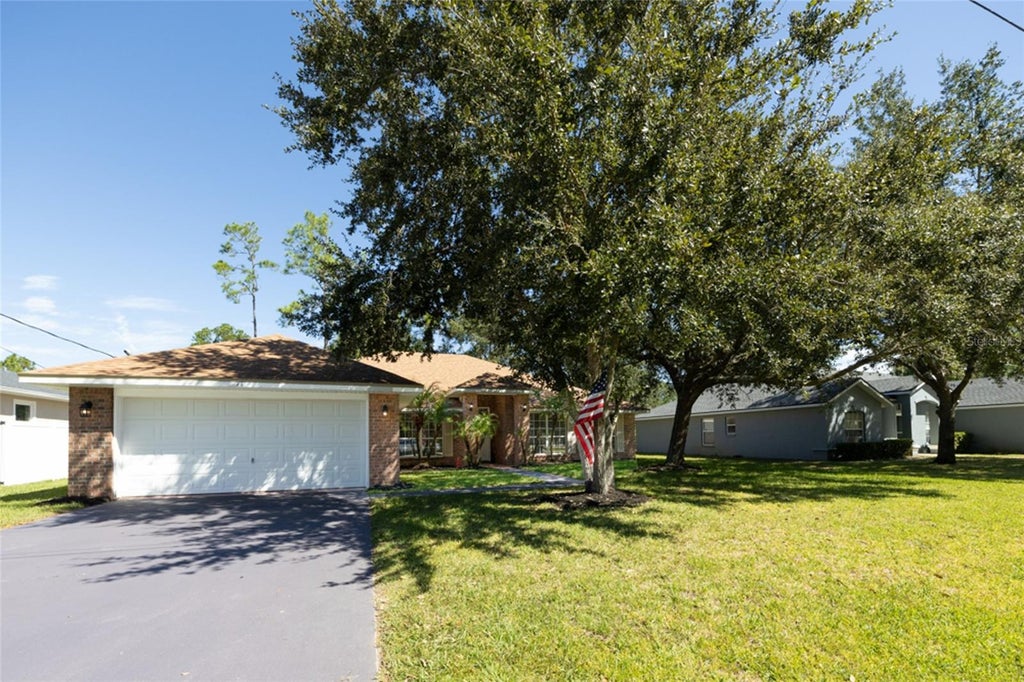 Photo of 71 Randolph Drive, Palm Coast, FL 32164 (MLS # FC321508)