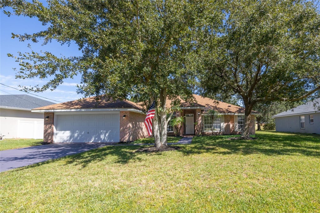 Photo of 71 Randolph Drive, Palm Coast, FL 32164 (MLS # FC321508)