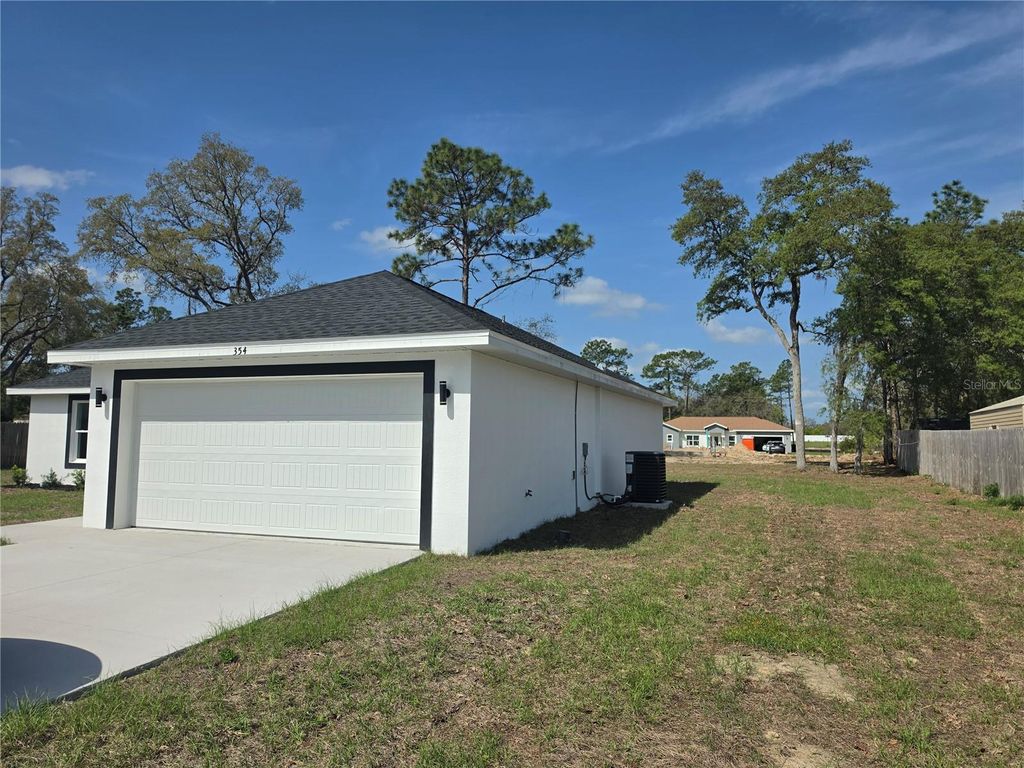 Photo of 354 Marion Oaks Pass, Ocala, FL 34473 (MLS # O6397128)