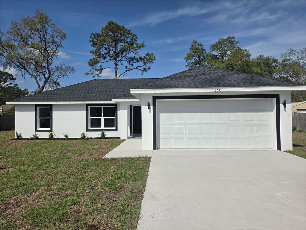 Photo of 354 Marion Oaks Pass, Ocala, FL 34473 (MLS # O6397128)