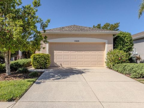 Photo of 11649 Tempest Harbor Loop, Venice, FL 34292 (MLS # TB8453347)