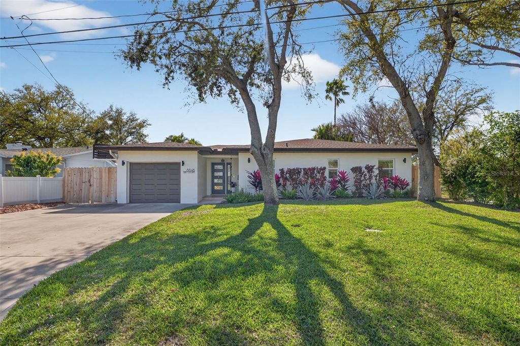 Photo of 8848 Sunlit Cove Drive NE, St Petersburg, FL 33702 (MLS # TB8486599)