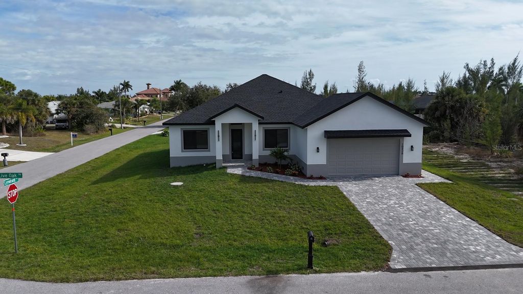 Photo of 10426 Live Oak Road, Port Charlotte, FL 33981 (MLS # O6367213)