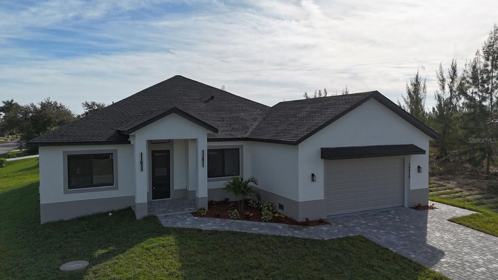 Photo of 10426 Live Oak Road, Port Charlotte, FL 33981 (MLS # O6367213)