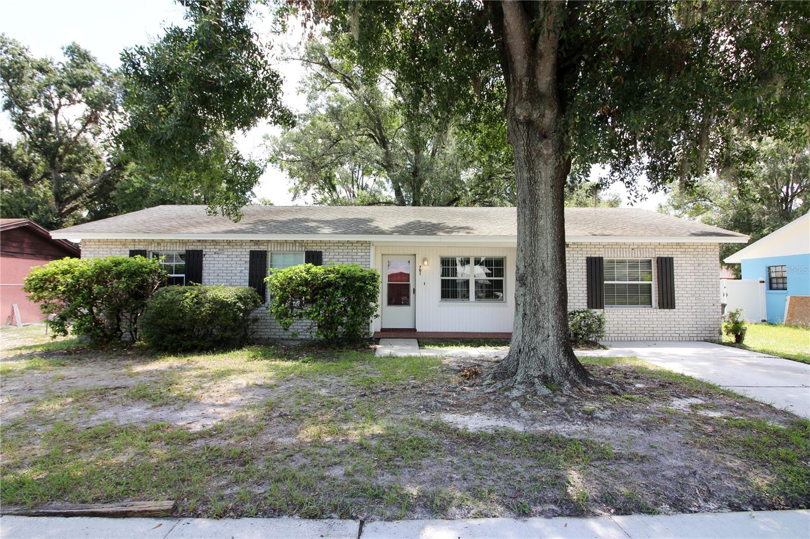 Charming 3 bedroom 2 bath home featuring tons of updates. As you enter the home you will notice the fresh bright paint colors and tile flooring throughout the whole house. The kitchen has been updated with new cabinets and solid surface countertops featuring a small breakfast bar area as you enter the breakfast nook. Down the hall you will find the primary suite with a fully updated bathroom with new shower tile and vanity. Bedroom 2 is located across the hall and has easy access to the hall bathroom. Hall bathroom also has been fully updated with new tile in the tub and updated vanity. The 3rd oversized bedroom is located at the front of the house and could be used as a bonus room or home office. The oversized laundry room features space for a second fridge or freezer. Just off the back of the house you will find the screened porch over looking the fenced back yard with large oak trees providing plenty of shade. Sorry No pets.