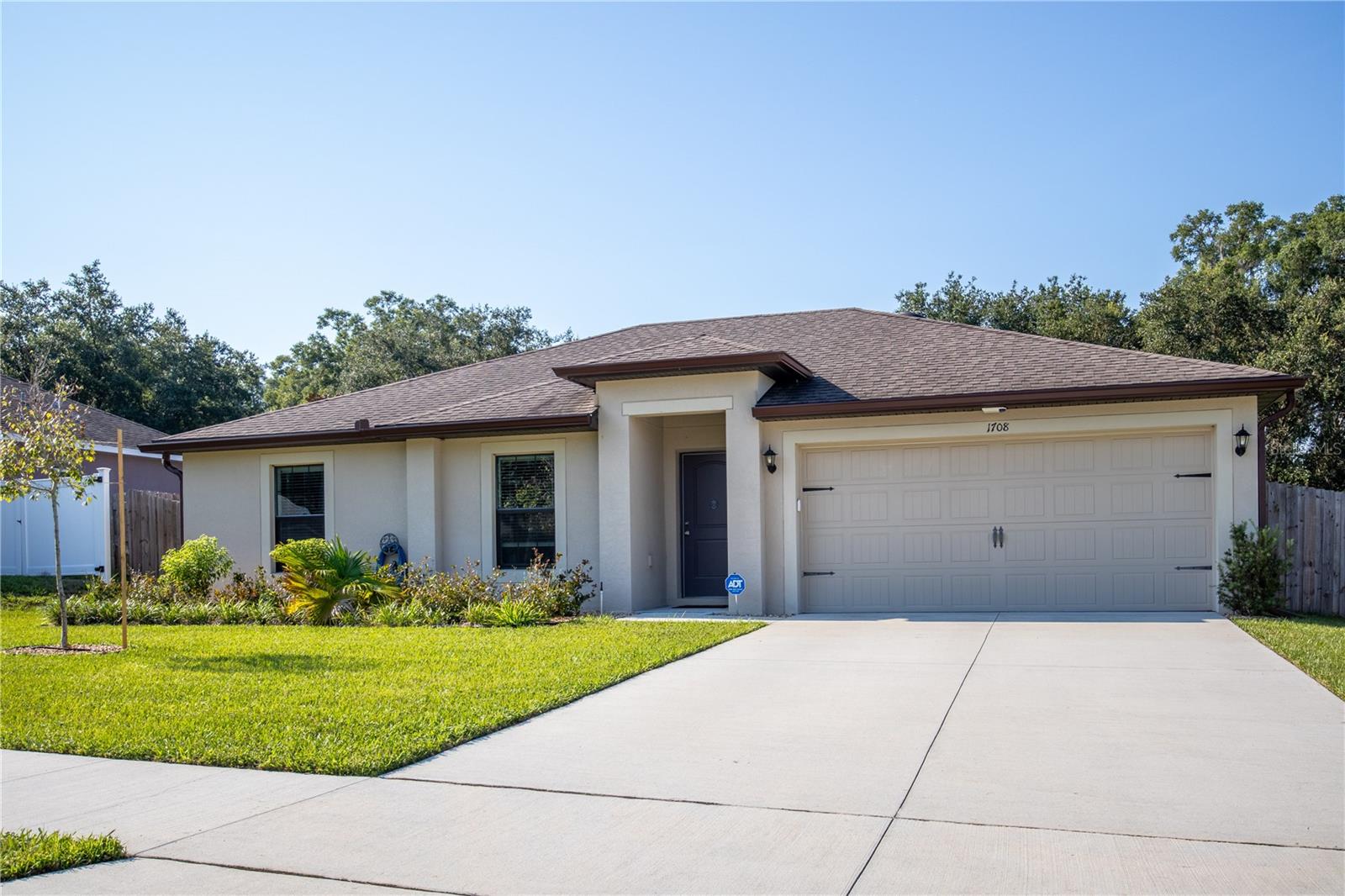 Beautifully Maintained Home in the Highlands of DeLand!
Welcome to this charming 3-bedroom, 2-bath split-plan home, built in 2018 and designed for both comfort and convenience. From the moment you arrive, you’ll be impressed by the home’s excellent curb appeal, manicured landscaping, and inviting design.
Step inside to find an open and bright layout, featuring a modern eat-in kitchen with stylish cabinetry and plenty of storage—perfect for daily living and entertaining. The Owner’s Suite offers privacy with its own en-suite bath, while two additional bedrooms share a full guest bath.
Relax or entertain in the fully fenced backyard with a 3-zone irrigation system, ideal for pets, family, or weekend barbecues.
Located in the sought-after Highlands of DeLand, you’ll be just minutes from shopping, dining, schools, and more.
This home is move-in ready, well cared for, and priced to sell—don’t miss your chance to make it yours!