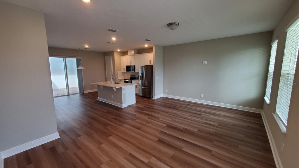 Photo of 7361 Alpine Butterfly Lane, Orlando, FL 32819 (MLS # O6416249)