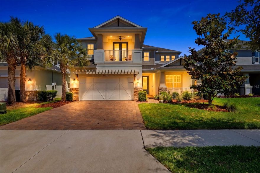Welcome to 13803 Stansil Ave, where thoughtful design meets elevated, turnkey living in the heart of Starkey Ranch. From the moment you arrive, the pavered driveway and upgraded elevation create a polished first impression, hinting at the level of detail carried throughout the home. Step inside through the front door into a bright, two story foyer, where wide plank luxury vinyl flooring, crown molding, and upgraded lighting immediately set the tone.  Just off the entry, a private office with elegant double French doors offers the perfect work-from-home space or flex room.  As you move further in, the home opens beautifully into a spacious, light-filled living area designed for both everyday living and entertaining.  The gourmet kitchen is truly the heart of the home—featuring 42” upper cabinets with crown molding, quartz countertops, a custom ceramic backsplash, under-cabinet lighting, and high-end built-in appliances. A large island with additional storage anchors the space, while the adjacent breakfast nook provides the perfect spot for casual dining with views of the backyard.  The living room flows seamlessly to the oversized screened lanai, creating the ultimate indoor-outdoor lifestyle. Here, you’ll enjoy a premium pond and conservation views, offering peaceful water views, added privacy, and direct access to walking trails right from your fenced backyard. The upgraded “no-see-um” screen enclosure ensures year-round comfort as you relax or entertain outdoors.  Upstairs, a spacious loft provides flexible living space, ideal for a media room, playroom, or second living area. The secondary bedrooms are well-sized and thoughtfully positioned, while upgraded plush carpeting and premium finishes continue throughout.  The primary suite is a true retreat, featuring custom-built closet systems and private access to a front balcony through double French doors, perfect for enjoying morning coffee or evening sunsets. The spa-like primary bathroom includes a frameless glass shower and elevated finishes designed for comfort and style.  Additional upgrades include plantation shutters on the first floor, upgraded blinds upstairs, solid wood stair treads, 8’ upgraded interior doors, designer light fixtures and fans, dimmer switches, a full home water softener, and epoxy-coated garage floors with overhead storage. Every detail has been carefully selected, making this home truly move-in ready and barely lived in.  Located in the award-winning Starkey Ranch community, residents enjoy miles of scenic trails, multiple resort-style pools, parks, playgrounds, and a vibrant community atmosphere. With top-rated schools, community events, and easy access to shopping, dining, and major roadways, Starkey Ranch offers a lifestyle that’s hard to match.  If you’ve been waiting for a home that combines premium upgrades, a stunning homesite, and effortless living...this is it!