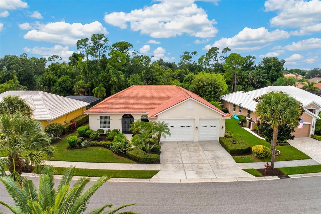 Photo of 679 Sawgrass Bridge Road, Venice, FL 34292 (MLS # TB8551622)