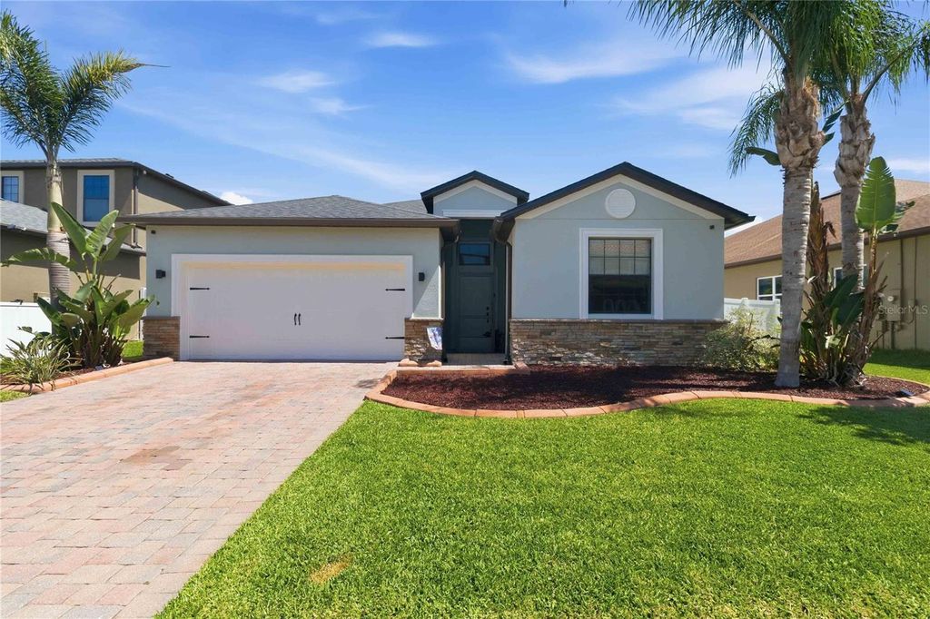 Photo of 4355 Summer Breeze Way, Kissimmee, FL 34744 (MLS # O6425290)