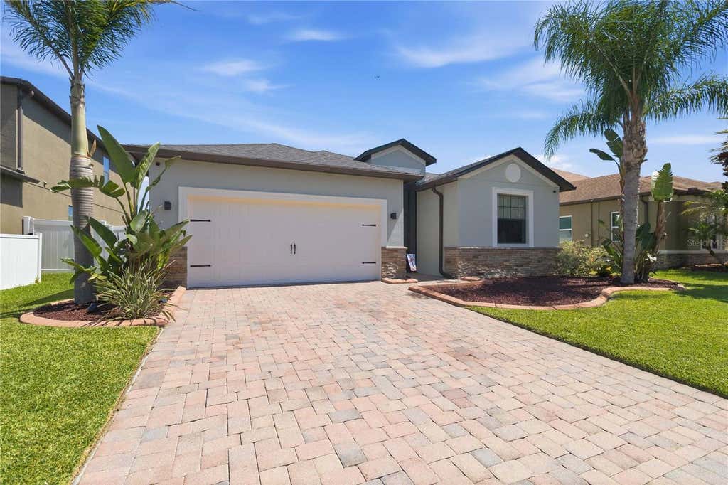 Photo of 4355 Summer Breeze Way, Kissimmee, FL 34744 (MLS # O6425290)