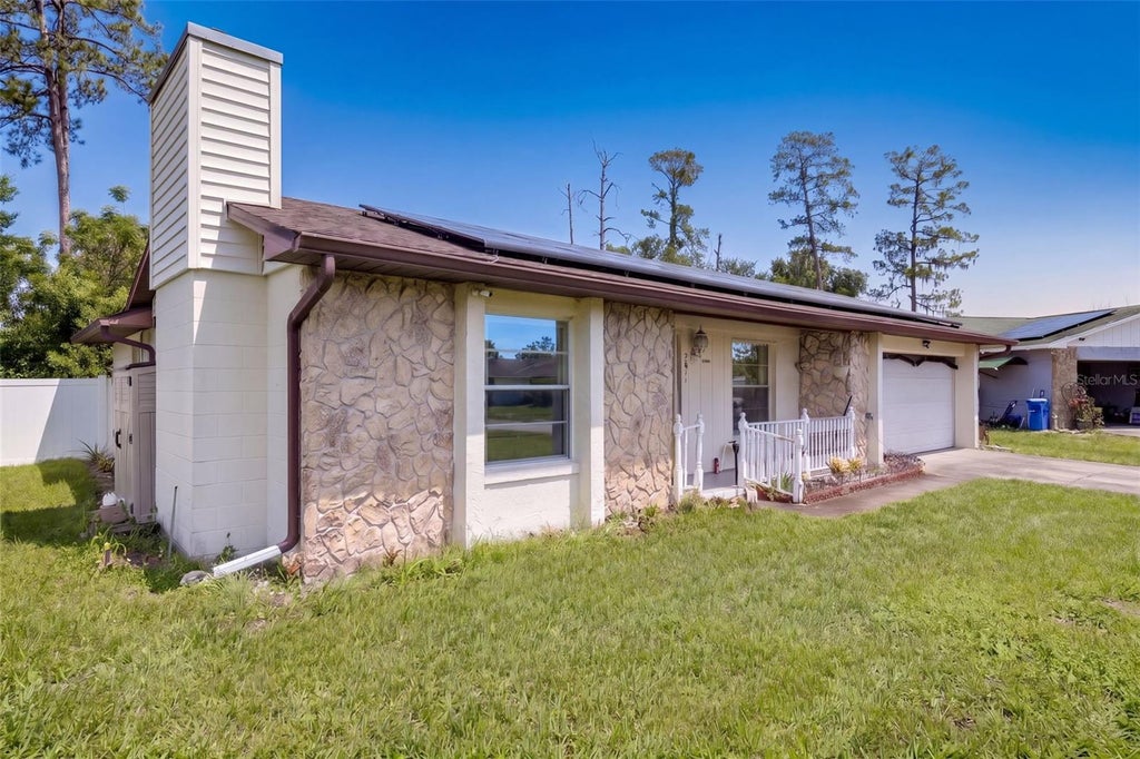 Photo of 2675 Clearbrook Circle, Orlando, FL 32810 (MLS # O6447960)