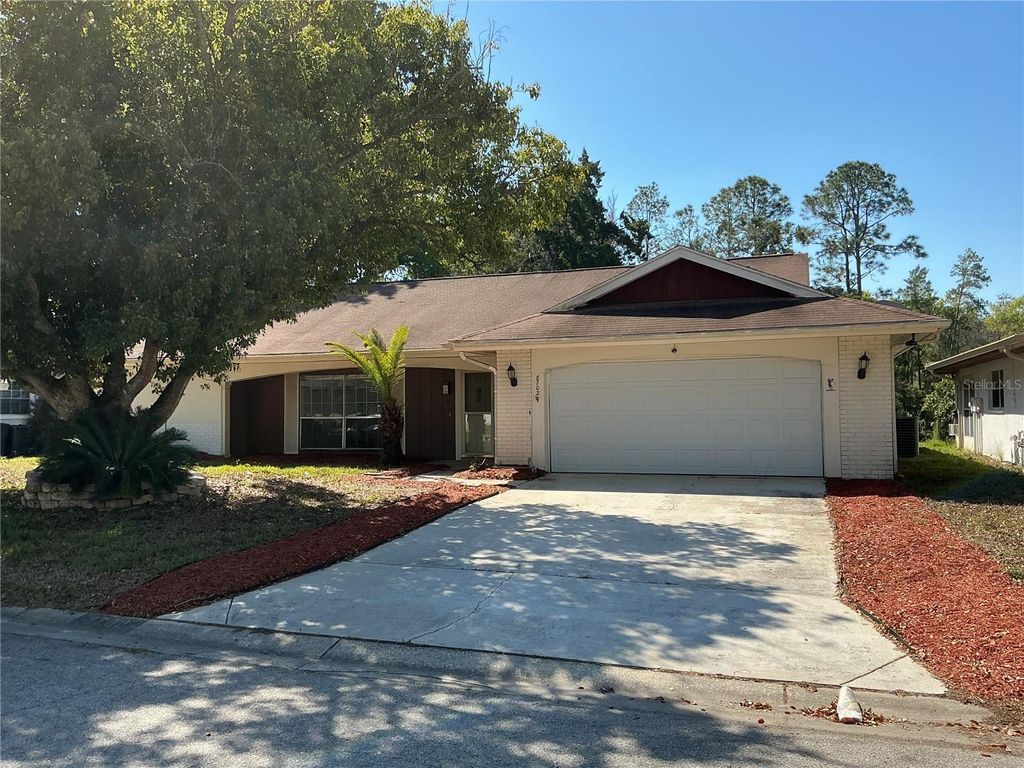 Photo of 8702 Village Mill Row, Hudson, FL 34667 (MLS # TB8489145)