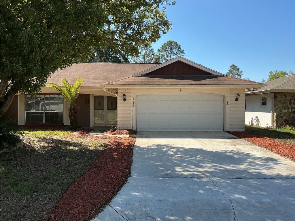 Photo of 8702 Village Mill Row, Hudson, FL 34667 (MLS # TB8489145)