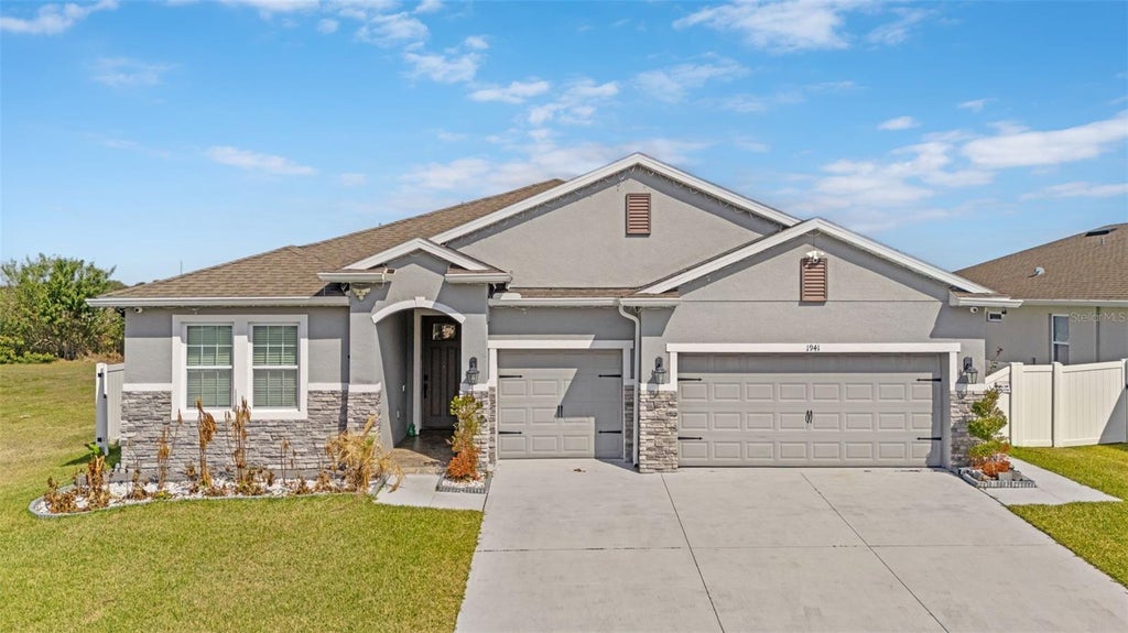 Photo of 1941 Partin Terrace Road, Kissimmee, FL 34744 (MLS # O6451509)