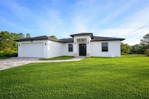 Photo of 4100 E 14th Street, Lehigh Acres, FL 33972 (MLS # C7520543)