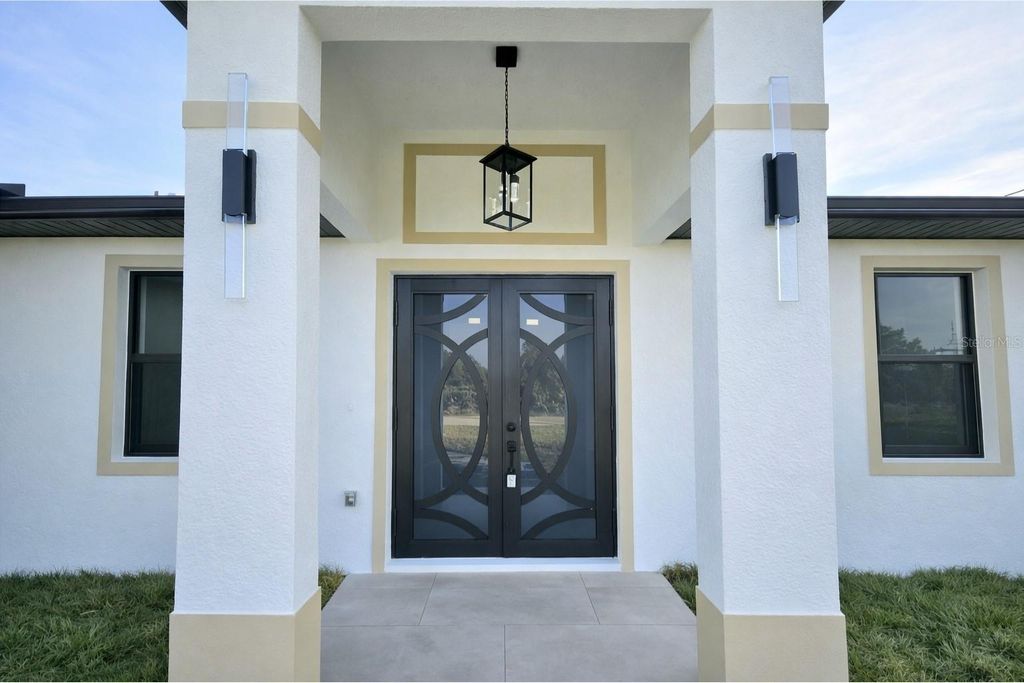 Photo of 4100 E 14th Street, Lehigh Acres, FL 33972 (MLS # C7520543)