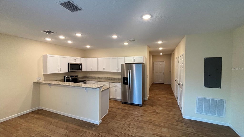 Photo of 280 Gardner Lane #4, Kissimmee, FL 34743 (MLS # O6434620)