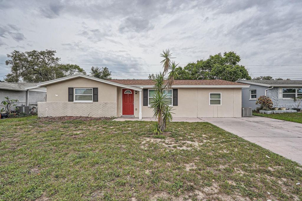 Photo of 5429 Flora Avenue, Holiday, FL 34690 (MLS # O6314390)