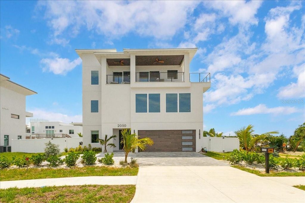 Photo of 2050 Atlantic Avenue S, Cocoa Beach, FL 32931 (MLS # V4945260)