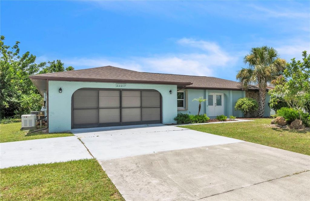 Photo of 22217 Olean Boulevard, Port Charlotte, FL 33952 (MLS # A4660105)