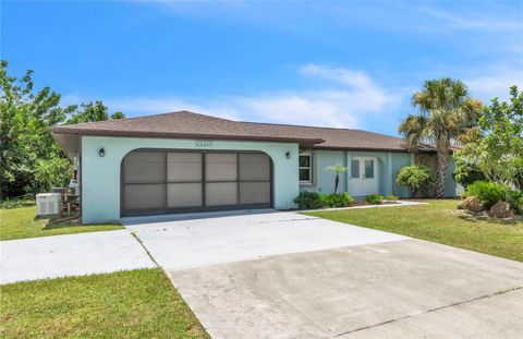 Photo of 22217 Olean Boulevard, Port Charlotte, FL 33952 (MLS # A4660105) Photo of 22217 Olean Boulevard, Port Charlotte, FL 33952 (MLS # A4660105)