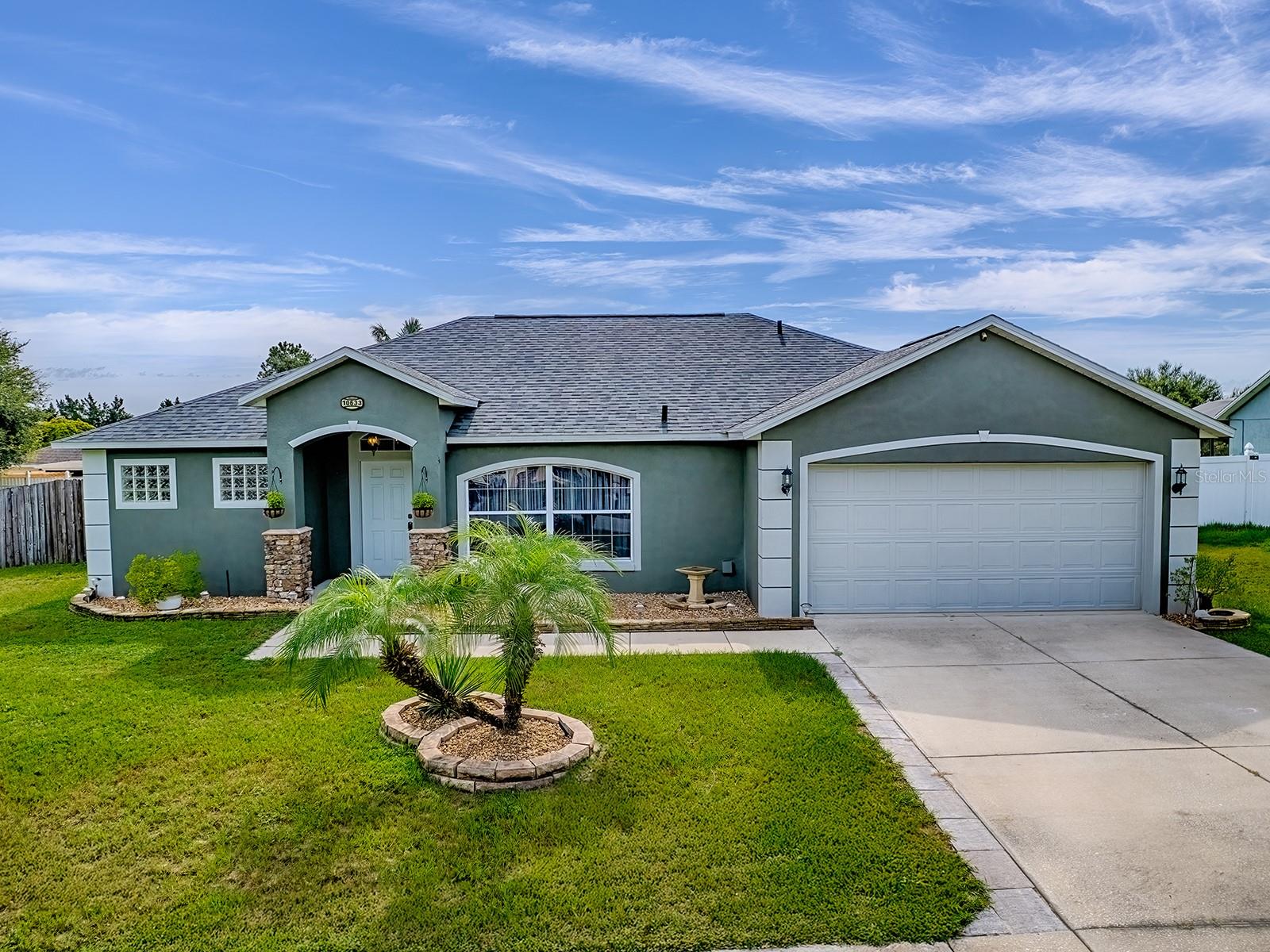 COME AND SEE THIS BEAUTIFUL 4/2/2 SALT WATER POOL HOME IN CLERMONT FLORIDA. LUXURY VINYL THROUGHOUT THE LIVING AREAS AND TILE FLOORING IN THE KITCHEN. THE KITCHEN OFFERS SS APPLIANCES WITH STONE BACK SPLASH AND RECESS LIGHTING WITH A STONE/WOOD DINING AREA IN THE KITCHEN WITH AND A SEPARATE DINING ROOM GREAT FOR FAMILY AND GUEST DINNERS. MASTER BEDROOM OFFERS DUAL SINKS WITH A GARDEN TUB AND SEPARATE SHOWER. THERE IS A BOSCH AC 2023 WITH A 10 YEAR WARRANTY, ROOF IS A 2023, POOL HEATER 2023, POOL PUMP 2023, NEW POOL CAGE 2023, HOUSE WAS PAINTED IN 2023, AND A SEPARATE LAUNDRY ROOM THAT OFFERS SHELVING AND CABINETS. THE PATIO WHICH LEADS OUT TO THE POOL IS ALL PAVED AND OFFERS A BEAUTIFUL BRICKED FIRE PIT. THE SALT WATER POOL HAS A SPA AND THE BACKYARD IS FENCED FOR PRIVACY AND A GREAT SPACE TO ENTERTAIN GUESTS. THIS PROPERTY IS BIENG OFFERED WITH A 13 MONTH HOME WARRANTY AT NO CHARGE TO THE BUYER.