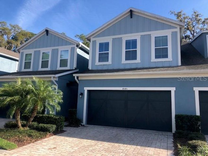 Annual rental townhome showcasing 3 bedrooms, 2.5 bathrooms, and 2 car garage and hardwood flooring throughout. The main level is spacious and bright with volume ceilings and large windows. Perfect to accommodate any large-scale furniture. The bedrooms, baths and loft area are all on the second story. The master bedroom offers a private, screened in balcony. Surprises include a full size laundry room, eat-in kitchen, oversized garage, all on a private cul-de-sac street. This home is very energy efficient! Hammock Park is a gated community, surrounded by 2 community ponds and mature lush landscaping. Close to Downtown Sarasota, the area's world-renowned beaches and easy access to I-75. First and security along with approved background check required to move in. Pet friendly, additional pet deposit and some restrictions apply. Water is Included!