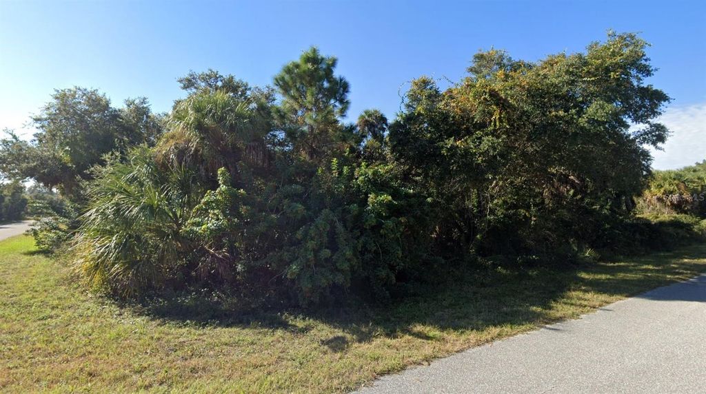 Photo of 17061 Alvin Avenue, Port Charlotte, FL 33948 (MLS # OM707816)