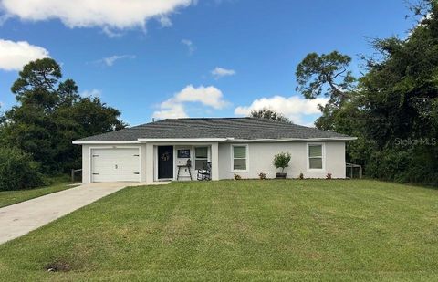 Photo of 207 Fletcher Street, Port Charlotte, FL 33954 (MLS # C7515699)