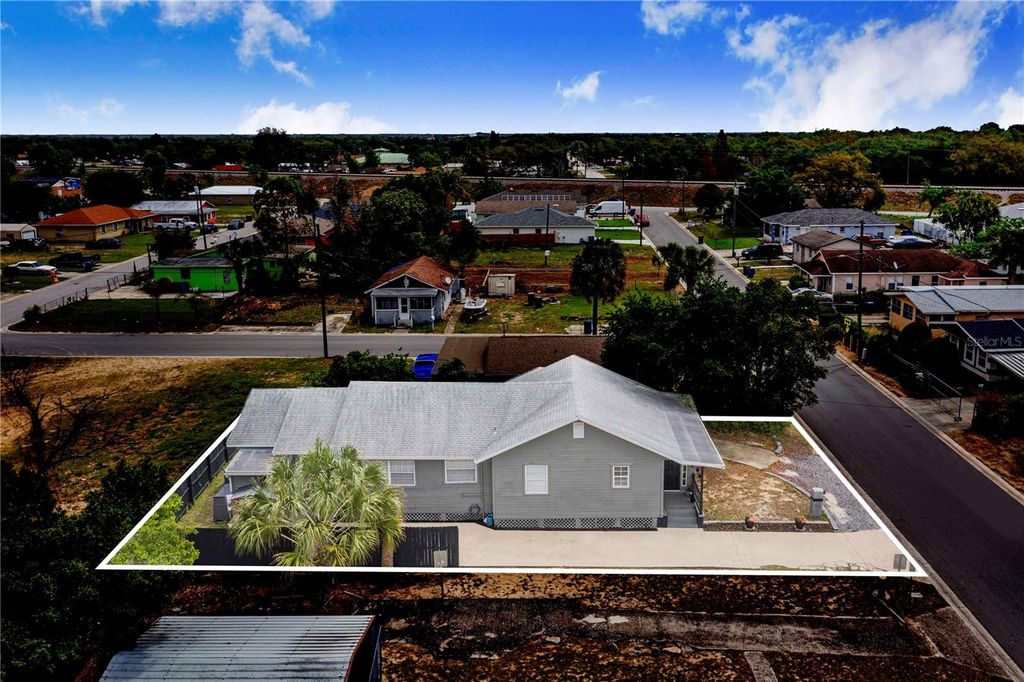 Photo of 1124 Avenue F, Haines City, FL 33844 (MLS # P4938432)