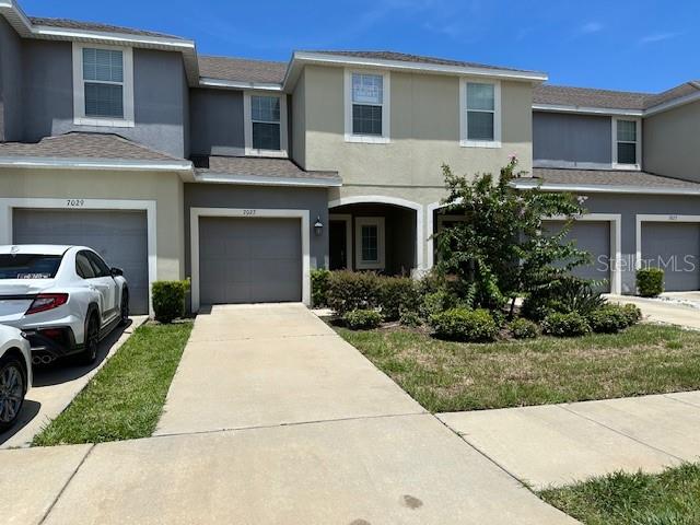 You will think you are leasing a brand new unit. This unit has been professionally cleaned and it is near like new condition. The first floor is ceramic tile with a modern on level granite counter tops. The kitchen is fully equipped with a pantry. One half bath for your convenience. Under stair storage. Single car garage.
The second level come with washer and dryer. the bedrooms are split and the master is spacious and open with a walk in closet. The master bath has a glass shower enclosure. The unit includes Cable, internet and water. There is a generous amount of space to the units behind the unit. Open patio to grill or enjoy the outside. There is a community club house and pool. Must have a minimum of 600 credit score. Schools are located nearby. Shopping and restaurants are close by. Interstate and major roads are close ez access to Lakeland Tampa or the beaches. Call Barb for an apt.