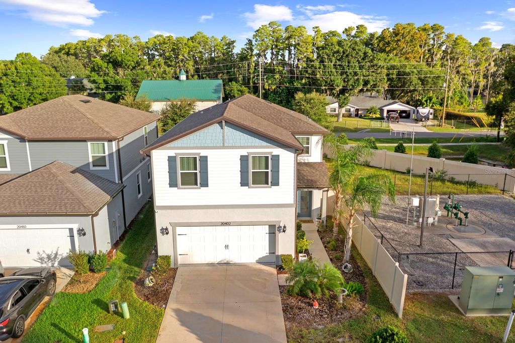 Photo of 20402 Monza Loop, Land O Lakes, FL 34638 (MLS # TB8473471)