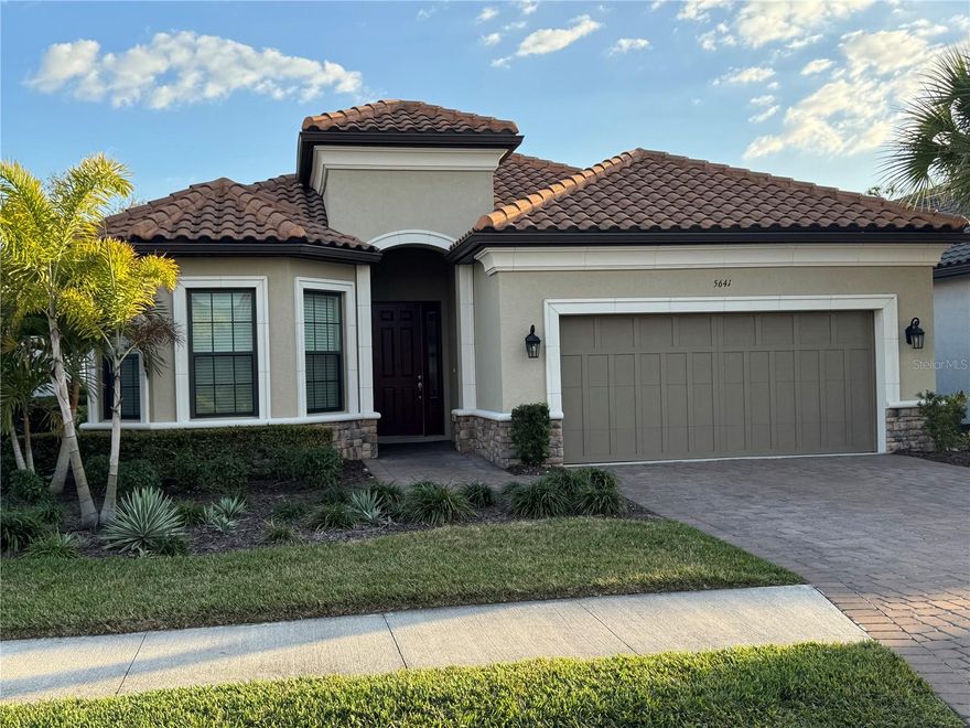 Welcome to the gated community of Bellacina by Casey Key, where luxury living meets natural serenity in the heart of Nokomis. This is the ONE that is affordably priced and ready for immediate move-in! This LAZIO MODEL is upgraded tastefully and offers 2,250 sq ft under air (3,036 gross sq ft total). The wonderful layout of this residence seamlessly connects the split plan design with an open floor plan, featuring eight-foot doors, high ceilings and large tiles throughout the main living area. The natural light flows easily through spacious rooms, with a clear sense of connection between living, dining and the lanai. Built in 2022 by Taylor Morrison with quality throughout and once you visit this home ... you will see that every area feels both functional and aesthetically pleasing, blending practical design with a warm, welcoming atmosphere! Beautiful chef's kitchen with an oversized island and breakfast bar, pantry, designer lighting, custom woodwork, attractive paint colors & more.  This home also features a two-car garage, paved driveway, nice landscaping and a covered, screened lanai that backs to a private backyard. Located on a quiet, dead-end street without a lot of through traffic make this home perfect for families and pets.  Added bonuses are wonderful neighbors and sidewalks throughout the community. Living in sought after Bellacina allows residents to enjoy an array of exclusive amenities, including a resort-style swimming pool, tennis court, four pickleball courts, fire pit, clubhouse with a chef's kitchen, state-of-the-art fitness center, bocce ball courts, dog parks, playground, direct access to Legacy Trail for bikers/runners/joggers and more! With activities ranging from yoga classes to live music events, there’s always something exciting happening in this vibrant and friendly community with so many social events. Experience luxury living at its finest in Bellacina. Schedule your private tour today and live your active Florida lifestyle in this sought-after community. The location is so convenient and within minutes to several Gulf Coast Beaches, fine restaurants, golf courses and within 30 minutes to cultural downtown Sarasota that offers movie theaters, dining, entertainment, opera, theaters and more. Mote Marine & UTC Mall are also within 30 minutes for fabulous shopping and dining. Make this immaculate home in this maintenance free community yours today. Lawn care is included in your HOA fees. Available for immediate occupancy! H-U-R-R-Y on this one before it's gone!