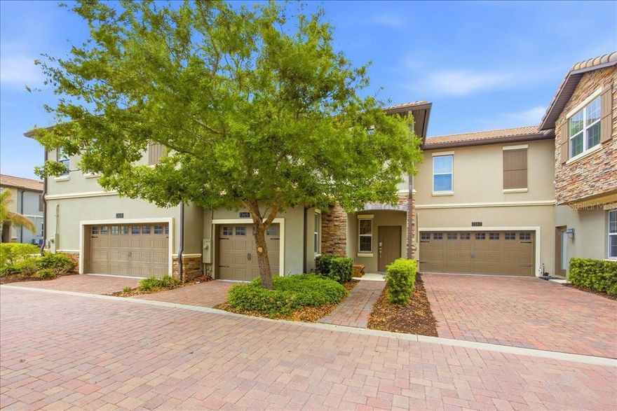 This Luxurious 'Fully Furnished Townhome' features 3 Bedrooms, 2.5 Bathrooms and a 1-car garage, situated in 'The Vistas', an Exquisite Community within the Nationally Recognized 'Championsgate Golf Course'. The property boasts a tile roof and an open floor plan on the first floor, which includes a gourmet kitchen fully equipped with quartz countertops, 42" cabinets, stainless steel appliances and you will also find a half bathroom and sliding doors that lead to a rear patio area. On the second floor, there is a reasonably sized loft area that can serve as a game room or office, depending on your needs.  As a Resident, you will not only enjoy your beautiful home, but also the many amenities that the Community has to offer, which includes a games room, golf simulator, fitness room, wet sauna and a 'Luxurious Resort-Style Swimming Pool with a Heated Spa. The Championsgate Golf Club and Community Pool are just a 3-minute walk away. Additionally, as a Resident of The Vistas, you will have free access to the 'Championsgate Vacation Resort Oasis Club', located just 5 minutes away. The Community is also perfectly situated within just minutes from Walt Disney World, the Omni Hotel and Resort, International Drive, I-4, and other exciting attractions. Residents and Visitors of 'The Vistas', can enjoy numerous recreational, dining, and shopping options, all within minutes from their doorstep. The HOA fee covers basic cable, internet, lawn maintenance and pest control. This beautiful home is 'move in ready', furnished to a high-quality standard.  Must be viewed to be fully appreciated!!