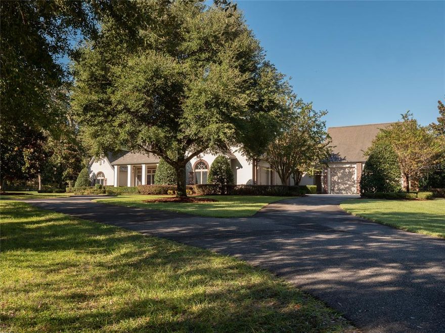 Located in deep in the heart of NW Ocala's horse country, less than 10 minutes to the World Equestrian Center, is this gorgeous 21+ acre European Country estate.   The elegant custom home spares no details, and features hardwood floors, travertine, crown moldings, beamed ceiling, and tons of large windows providing beautiful views of the pastures beyond.  The chef's kitchen goes above and beyond in functionality and beauty, and would satisfy the tastes of the most discerning chef.  The stunning master suite opens to the back patio, and you'll never want to leave the luxurious bath.  This farm provides a gated entrance and beautifully maintained board-fencing throughout.  There are 8 lush green paddocks, round pen, and a WordleyMartin irrigated arena.  The barn emulates the design of the home, and features 10 European-designed custom stalls, studio apartment with full bath and walk-in closet, office/tack room with 1/2 bath, laundry, fly spray, and plenty of storage.  There are 3 run-in sheds in the paddocks, providing 3 additional stalls.  This farm is meticulously maintained and ready for you and your horses to enjoy.