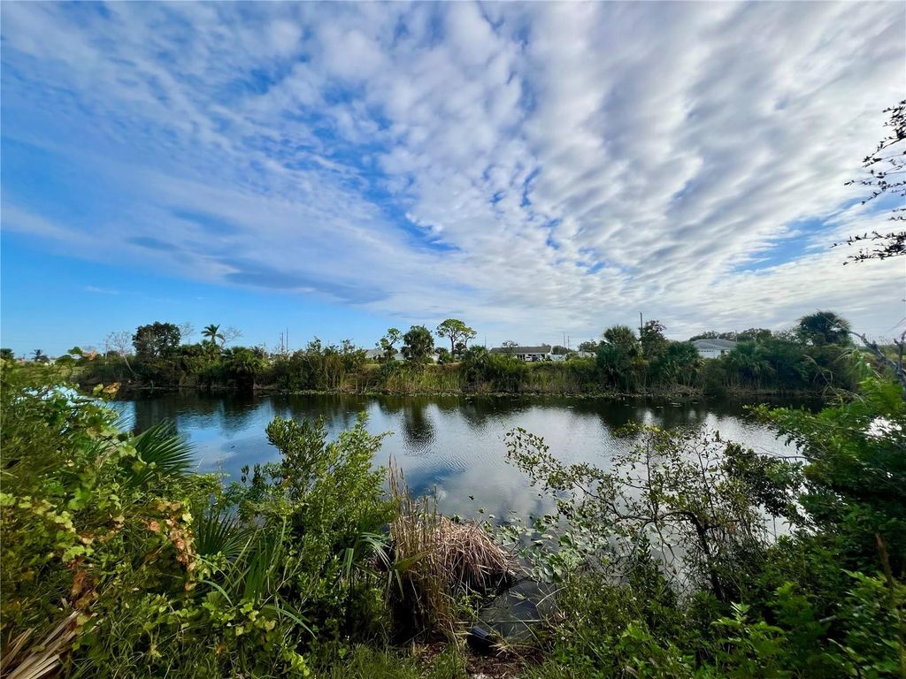 Photo of 1857 NE 23rd Street, Cape Coral, FL 33909 (MLS # C7523296)