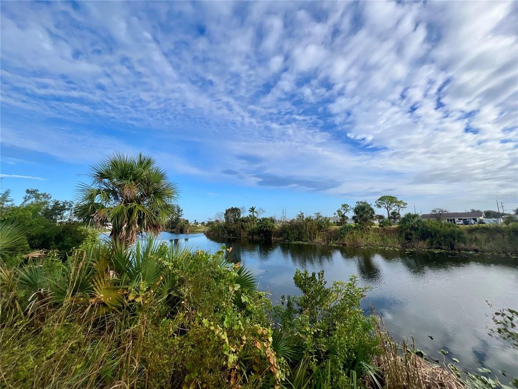 Photo of 1857 NE 23rd Street, Cape Coral, FL 33909 (MLS # C7523296)